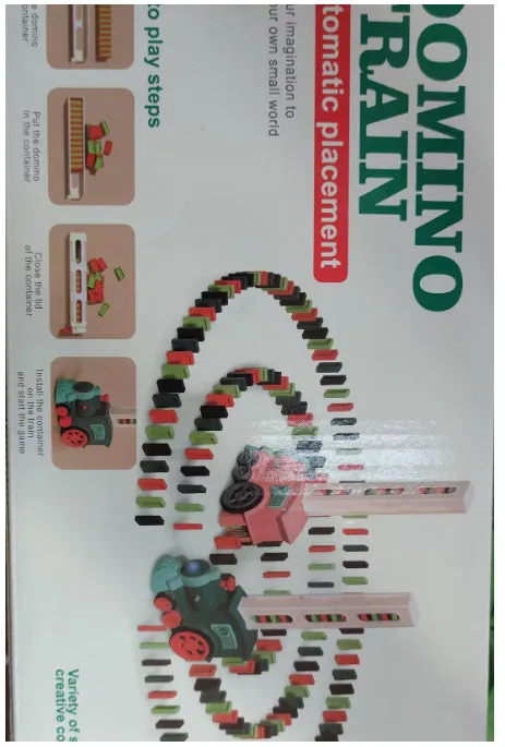 Domino train toy with 100 plastic dominoes in random colours, including toy train and card storage box
