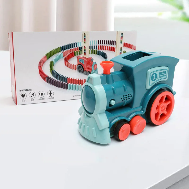 Domino train toy with 100 plastic dominoes in random colours, including toy train and card storage box