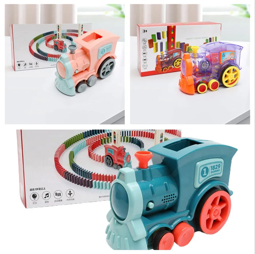 Domino train toy with 100 plastic dominoes in random colours, including toy train and card storage box