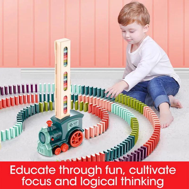Domino train toy with 100 plastic dominoes in random colours, including toy train and card storage box