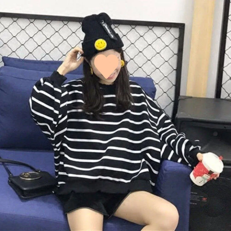 Women's loose fit long sleeve thermal striped T-shirt in white, front view, flight sleeve design