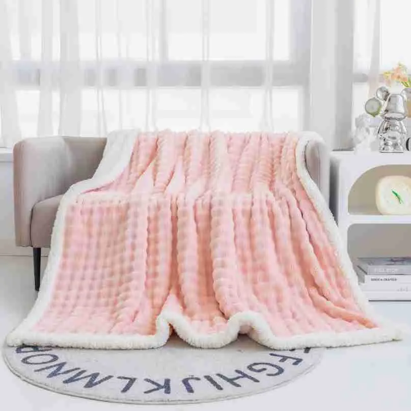 Bubble double layer thick lambskin blanket in beige on a sofa