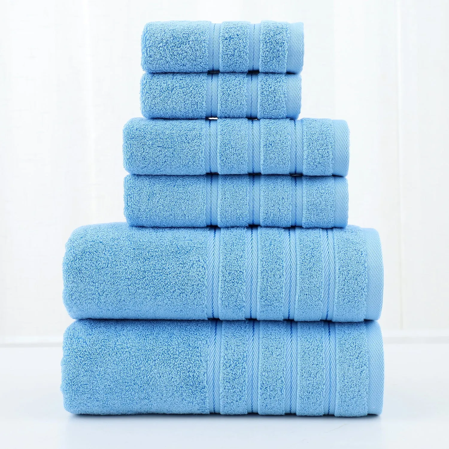 Combed cotton six-piece towel set in multiple colours including black, white, maroon, lavender, and light pink