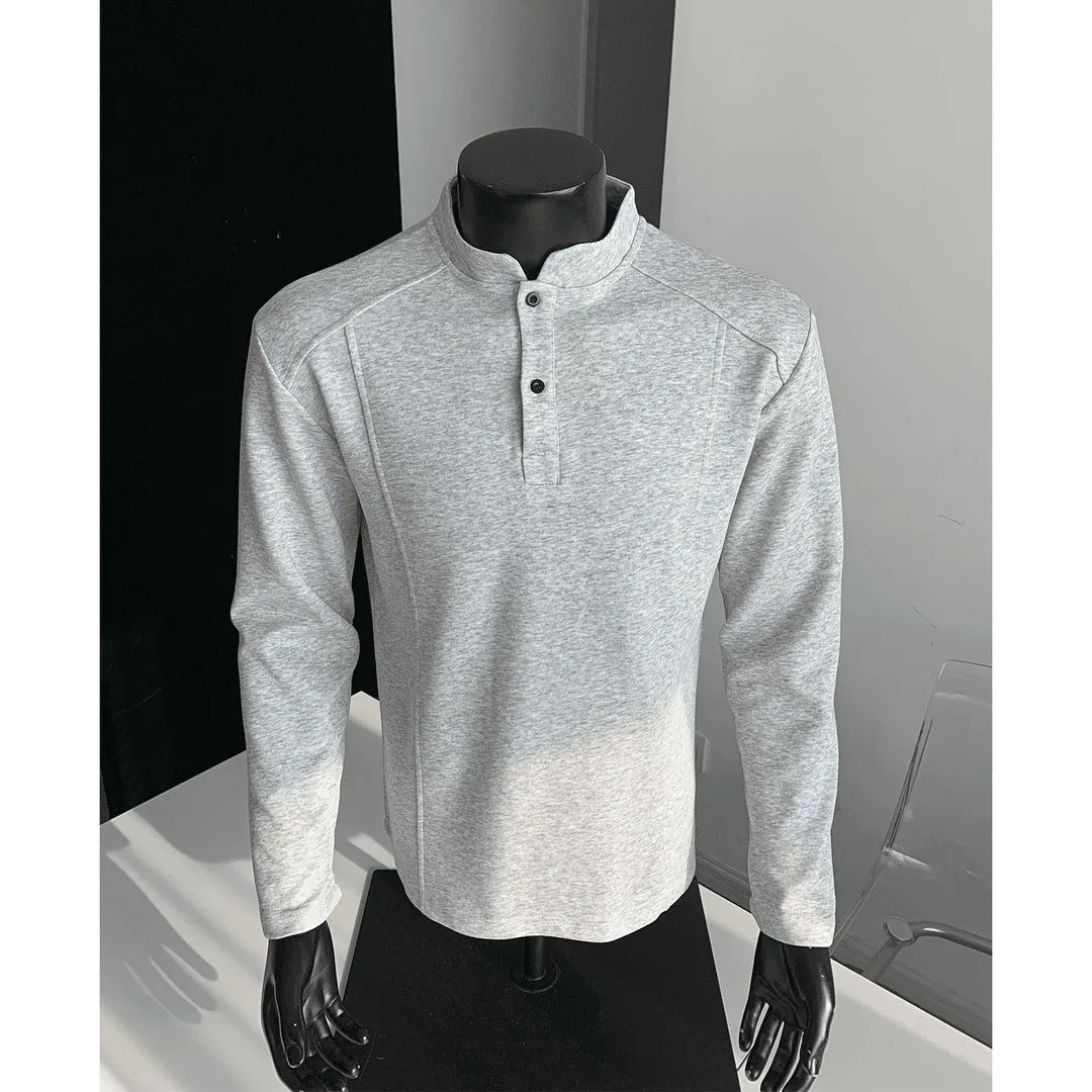 Men's grey asymmetric polo shirt with a patchwork stand-up collar and long sleeves.