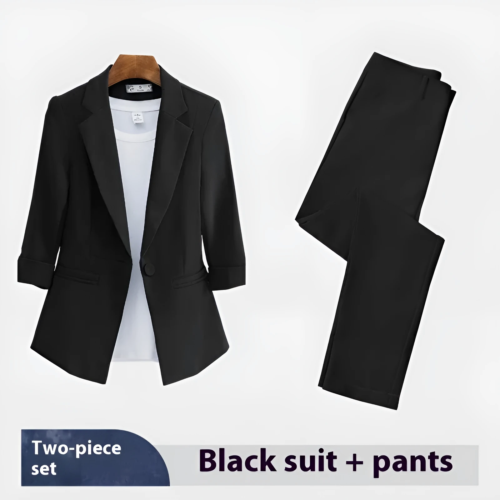Blue polyester formal suit set with long sleeve jacket and cropped pants on a model