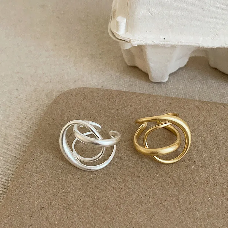 Three-dimensional interlaced matte metal open ring for women in geometric design