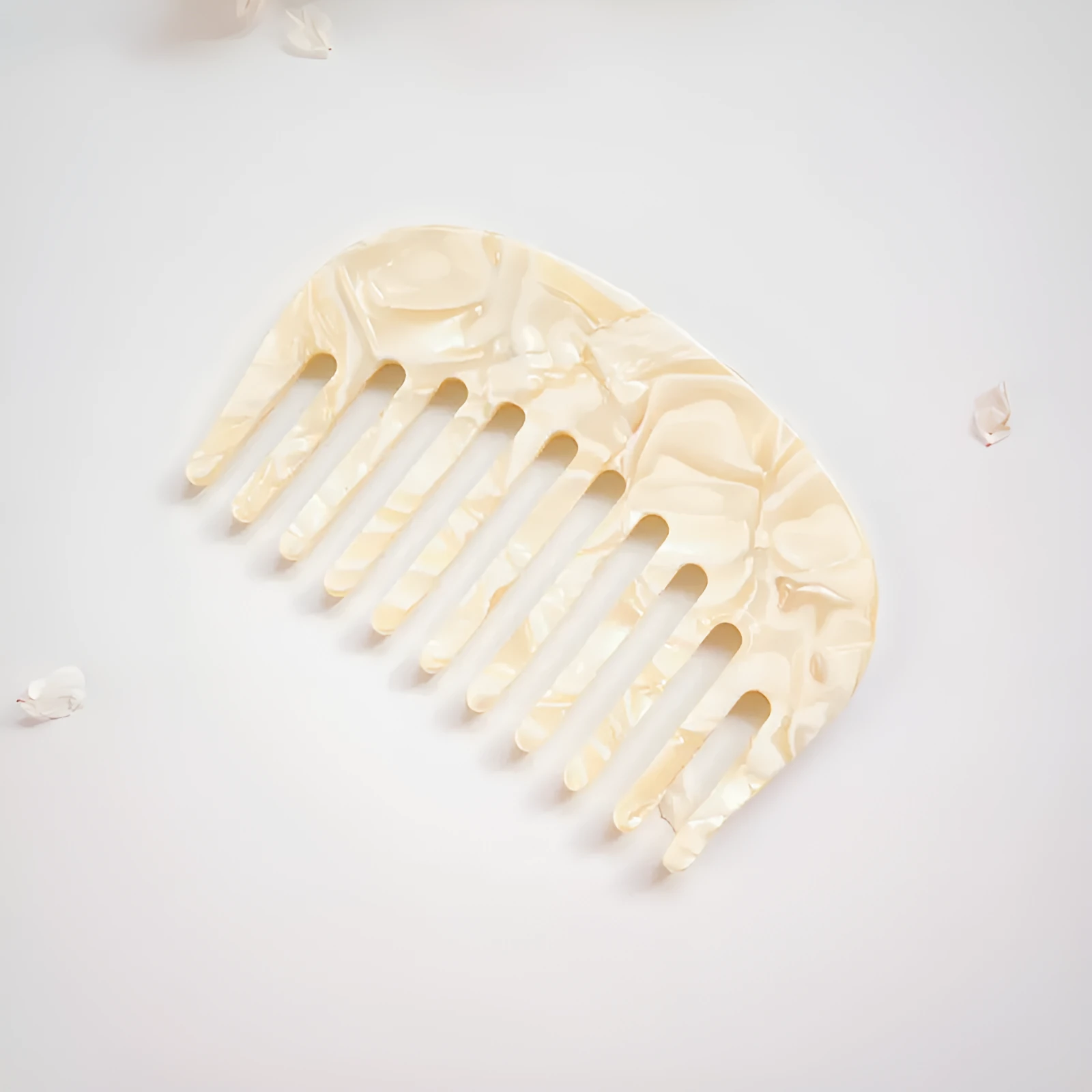Acetate retro hair comb in cherry blossom powder colour, size 10x6.2cm, compact design