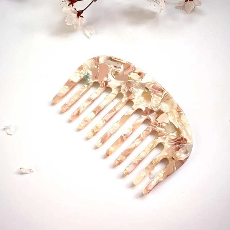 Acetate retro hair comb in cherry blossom powder colour, size 10x6.2cm, compact design