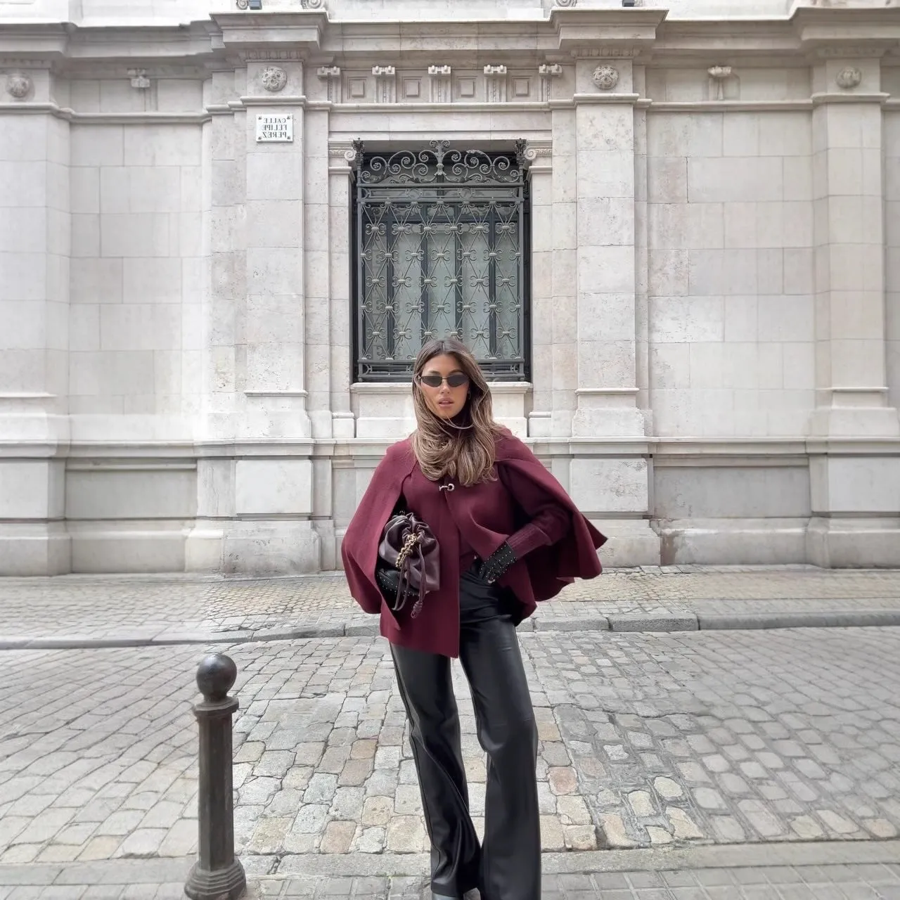 Cape round neck long sleeve knitted sweater coat in solid dark gray with regular sleeves for street fashion style