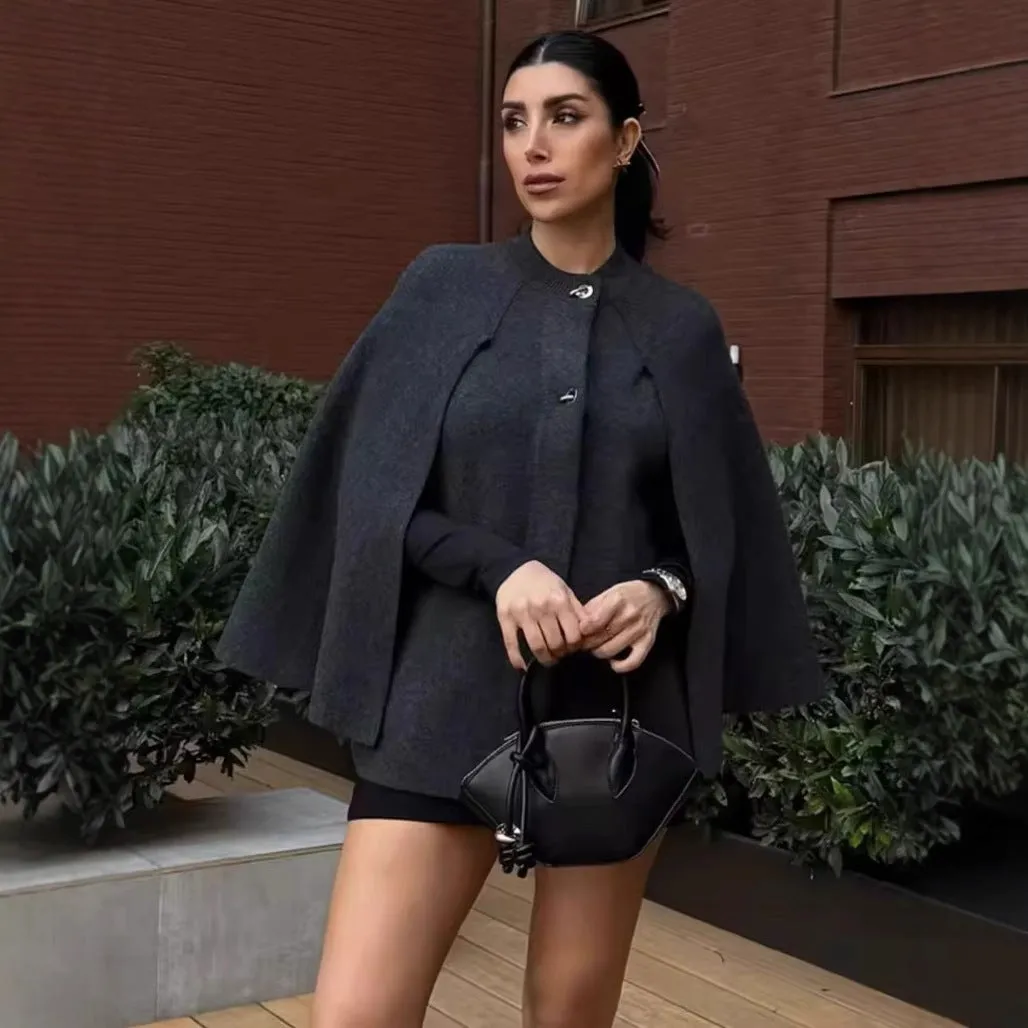 Cape round neck long sleeve knitted sweater coat in solid dark gray with regular sleeves for street fashion style