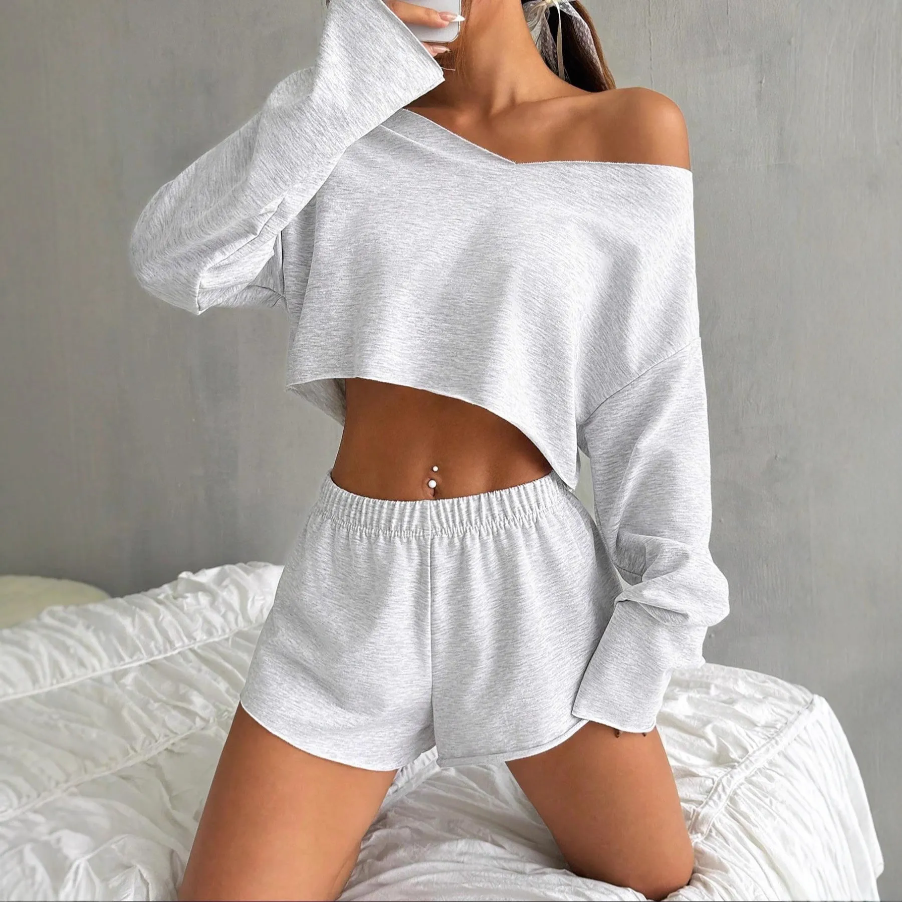 Women's gray cotton long-sleeve blouse and shorts suit set on flat lay