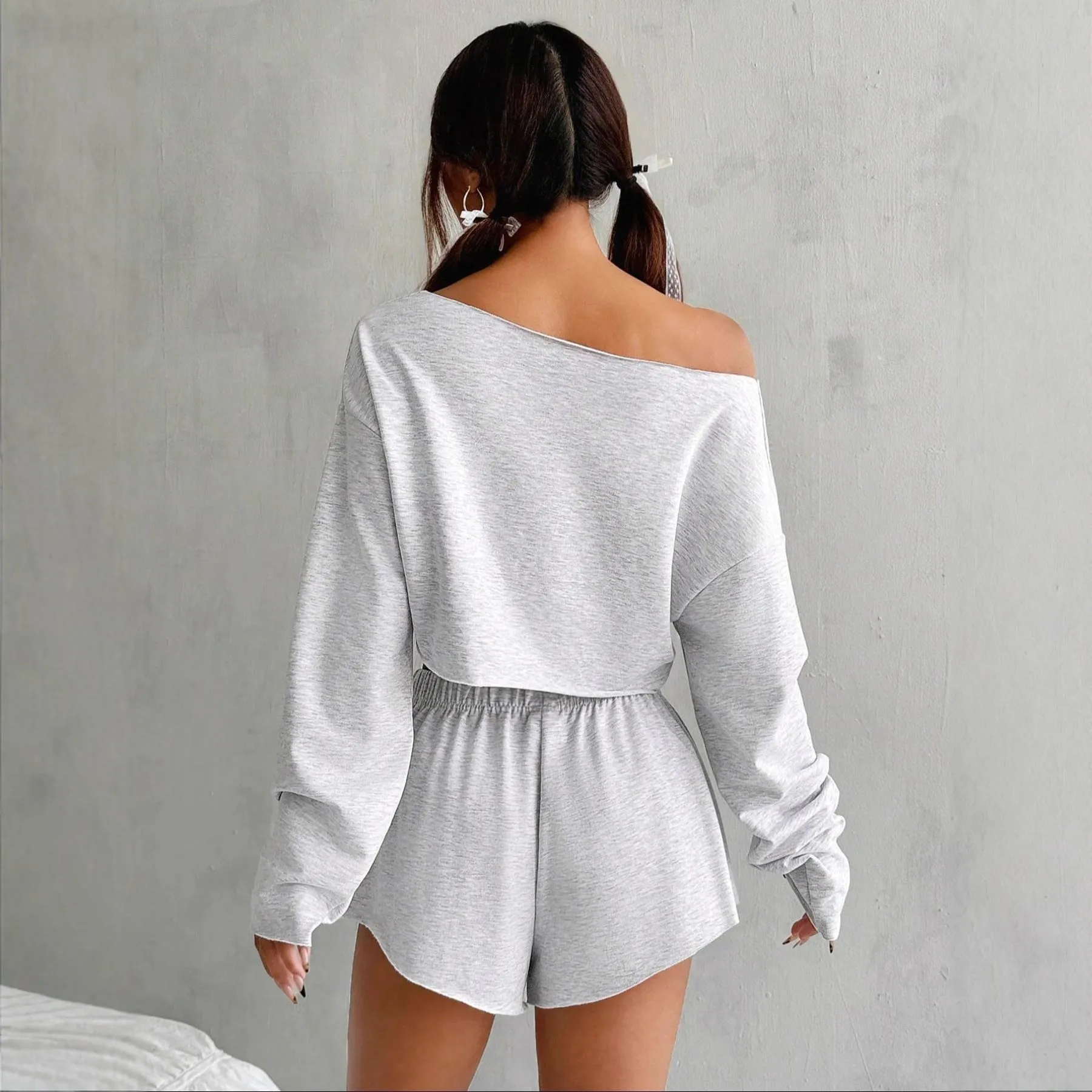 Women's gray cotton long-sleeve blouse and shorts suit set on flat lay