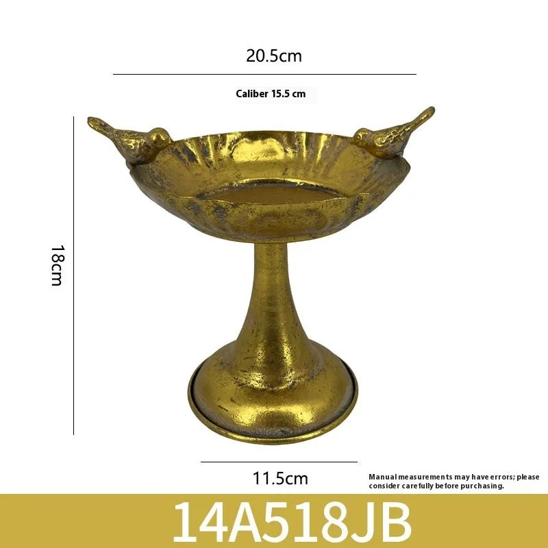 Metal decorative vase with black and gold finish, modern simplicity design on a tabletop