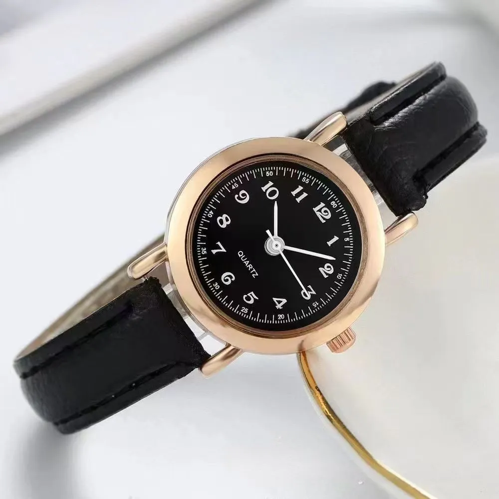 Retro Korean style cute literary couple watch with 26mm round dial, thin imitation leather strap, and spiral crown