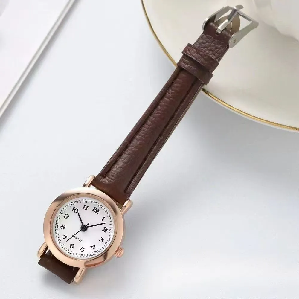 Retro Korean style cute literary couple watch with 26mm round dial, thin imitation leather strap, and spiral crown