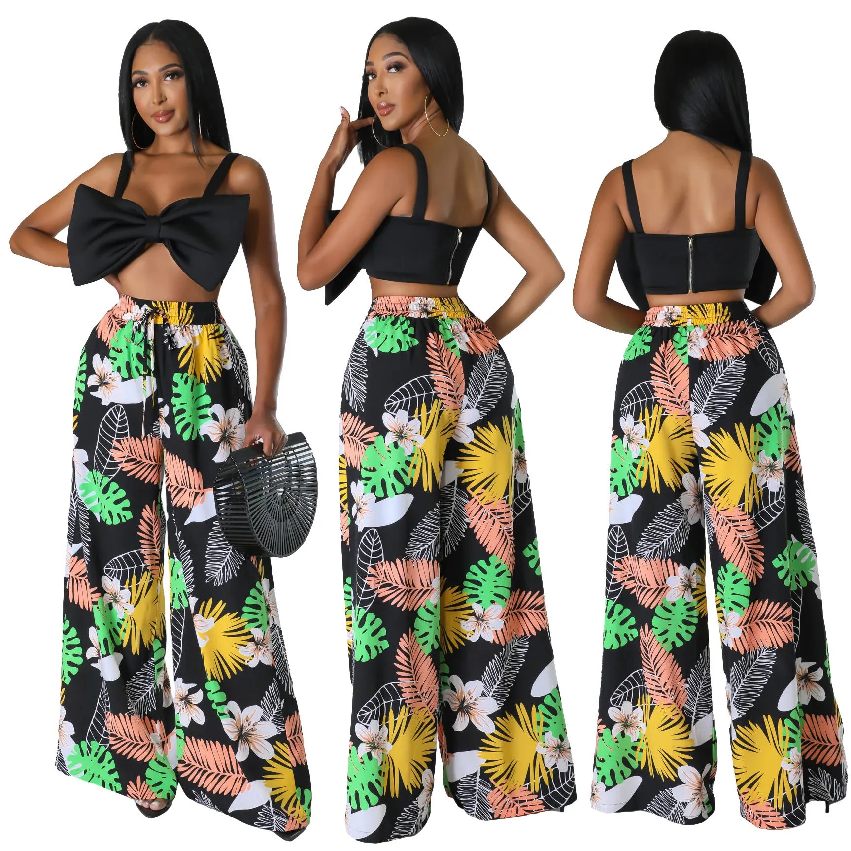 Women's high waist printed wide leg trousers in polyester fiber available in multiple colours