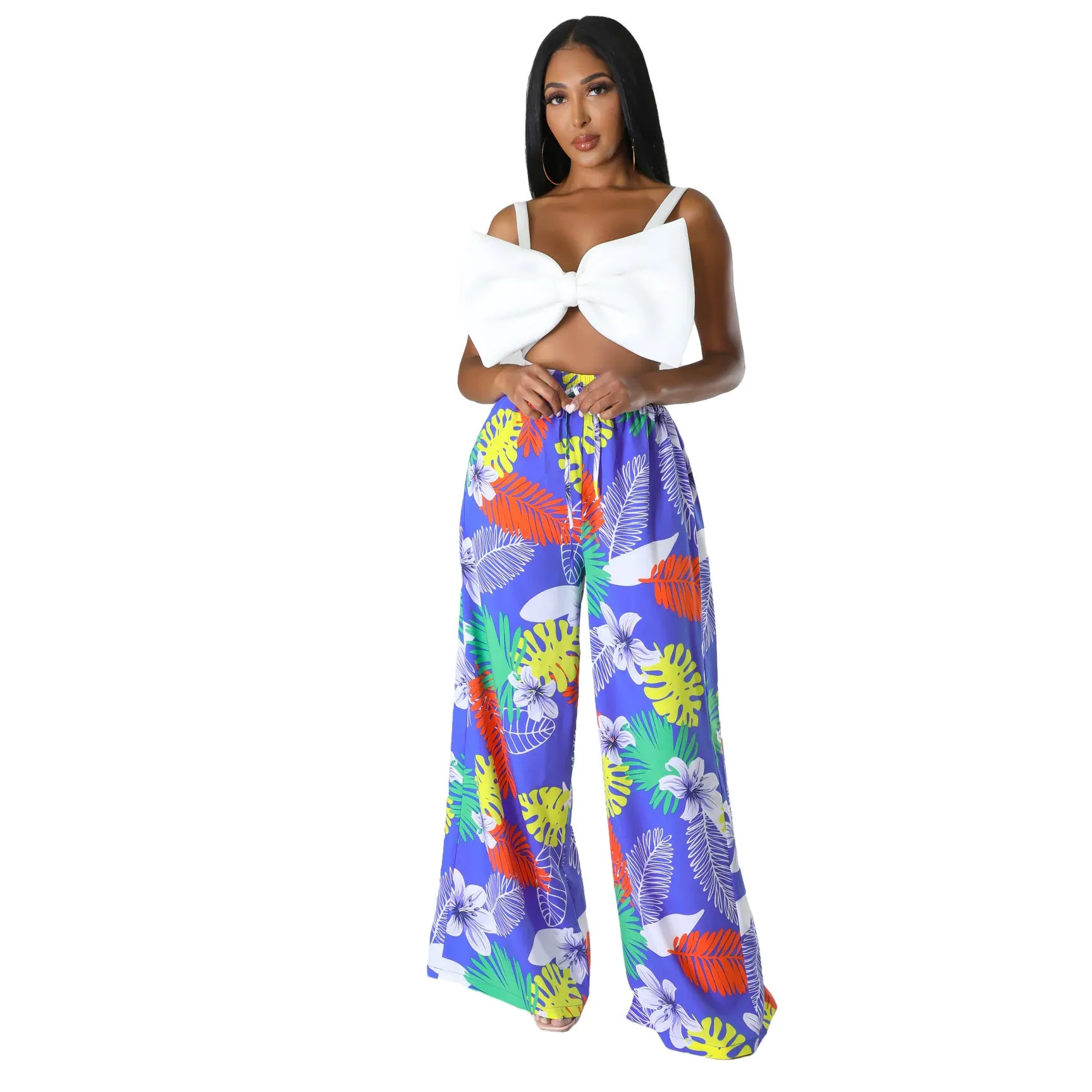 Women's high waist printed wide leg trousers in polyester fiber available in multiple colours
