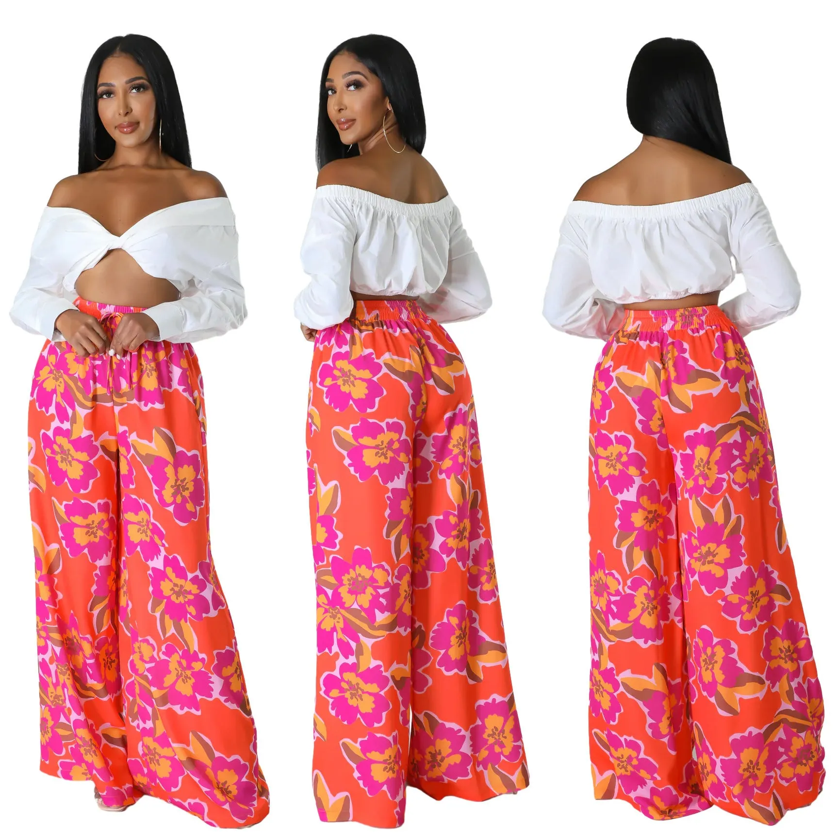 Women's high waist printed wide leg trousers in polyester fiber available in multiple colours