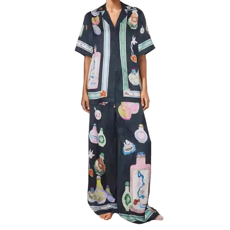 Black women's casual set with cartoon print, featuring a cardigan and matching trousers