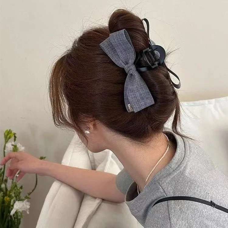 Blue denim bow barrette with cloth bow and metal clip on women back head hair