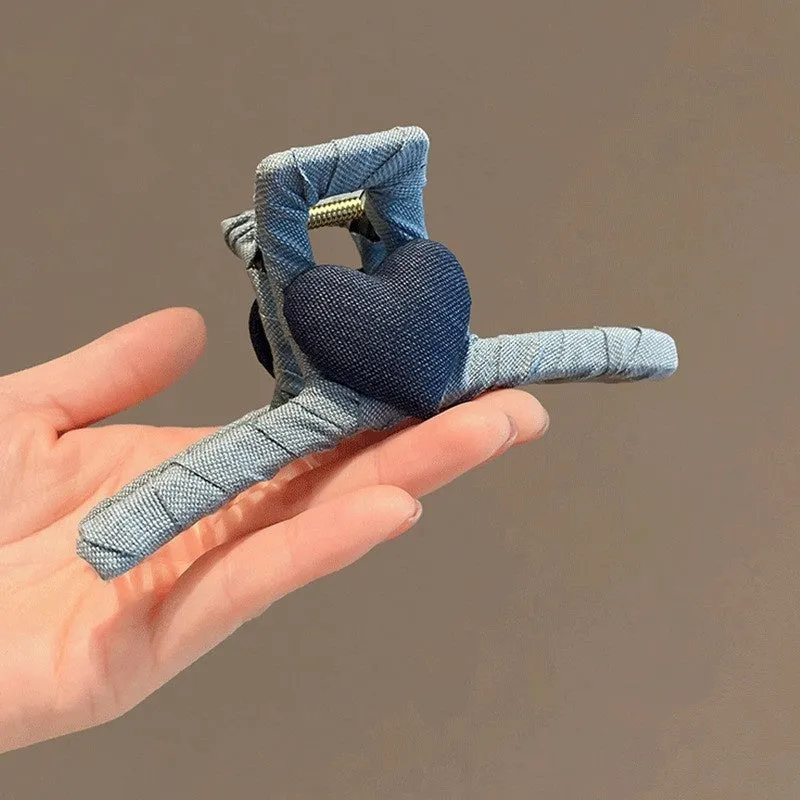 Blue denim bow barrette with cloth bow and metal clip on women back head hair