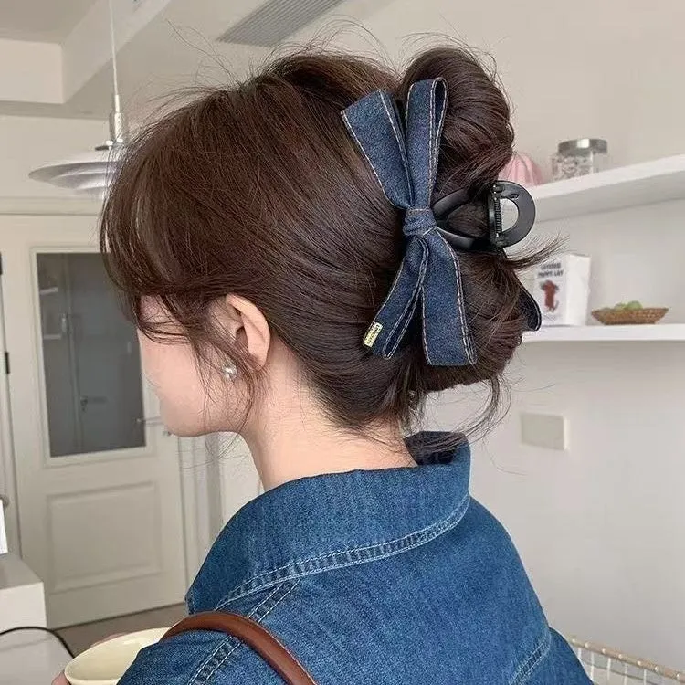 Blue denim bow barrette with cloth bow and metal clip on women back head hair