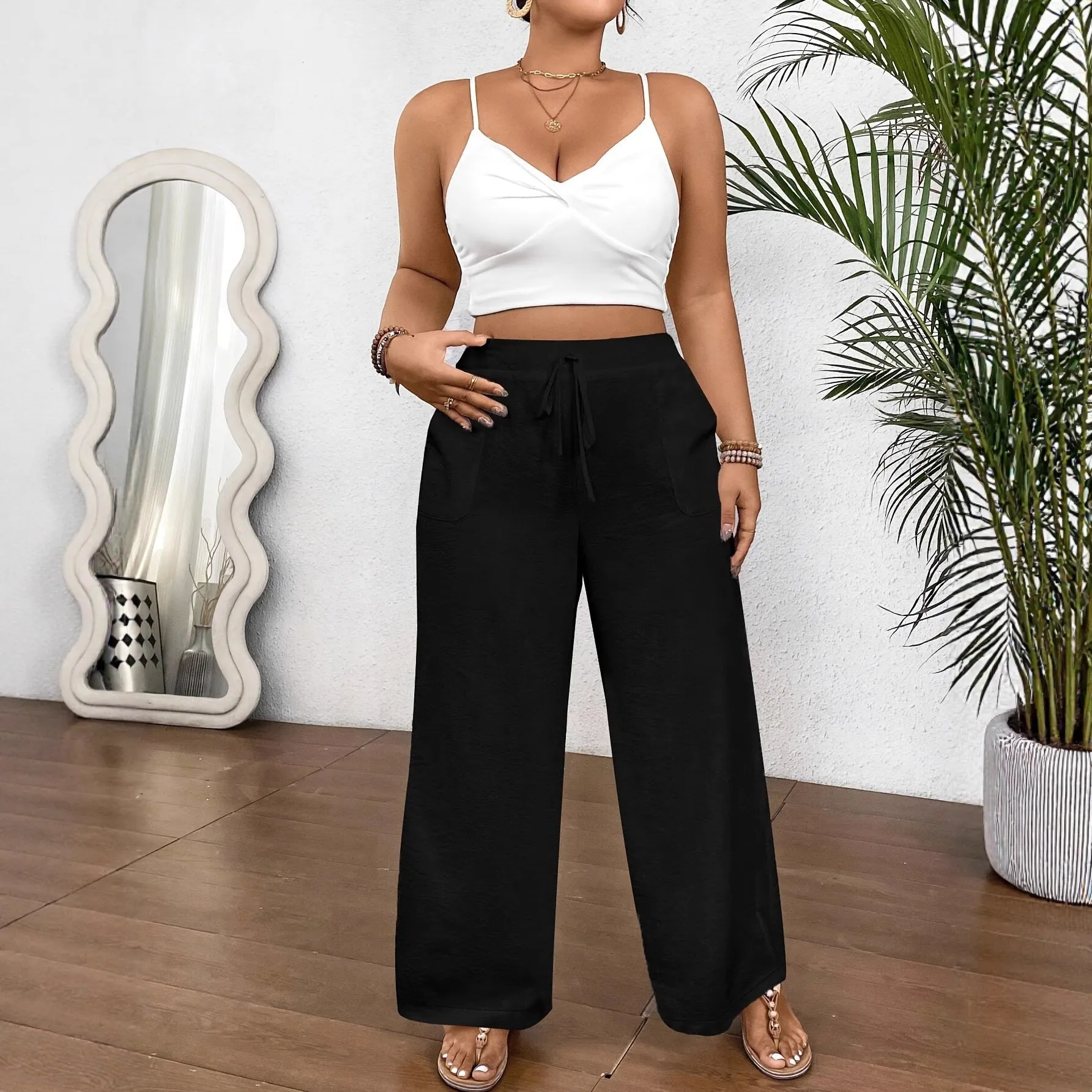 Women's drawstring wide leg polyester trousers in khaki with side pockets and loose fit