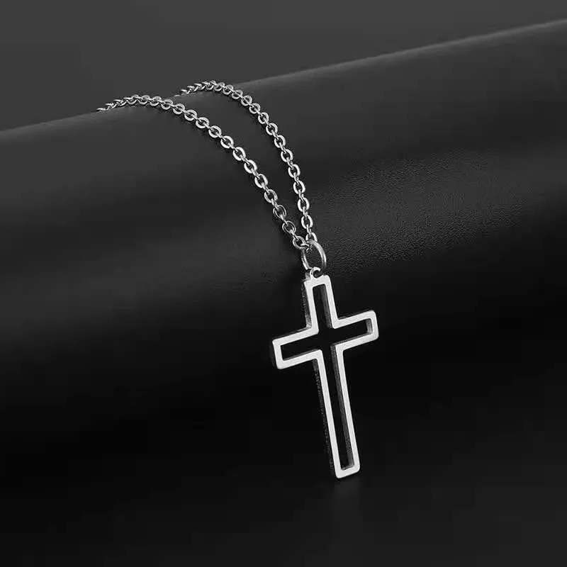 Unisex titanium steel cross necklace with electroplated gold finish on a stainless steel chain