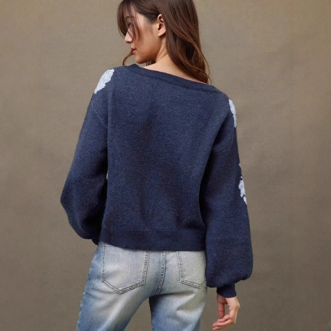 Sapphire blue women's pullover with floral jacquard pattern, loose fit, and off-neck design