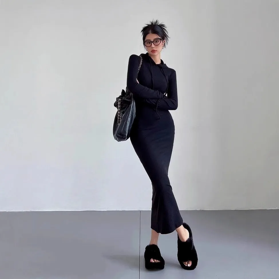 Women's light gray hooded sheath dress with long sleeves and a high waist on a hanger
