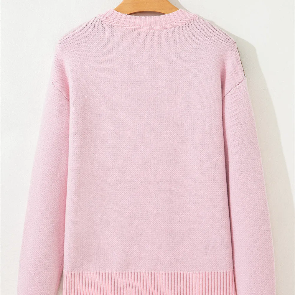 Women's spring round neck loose acrylic sweater in pink with long flight sleeves, shown on female model