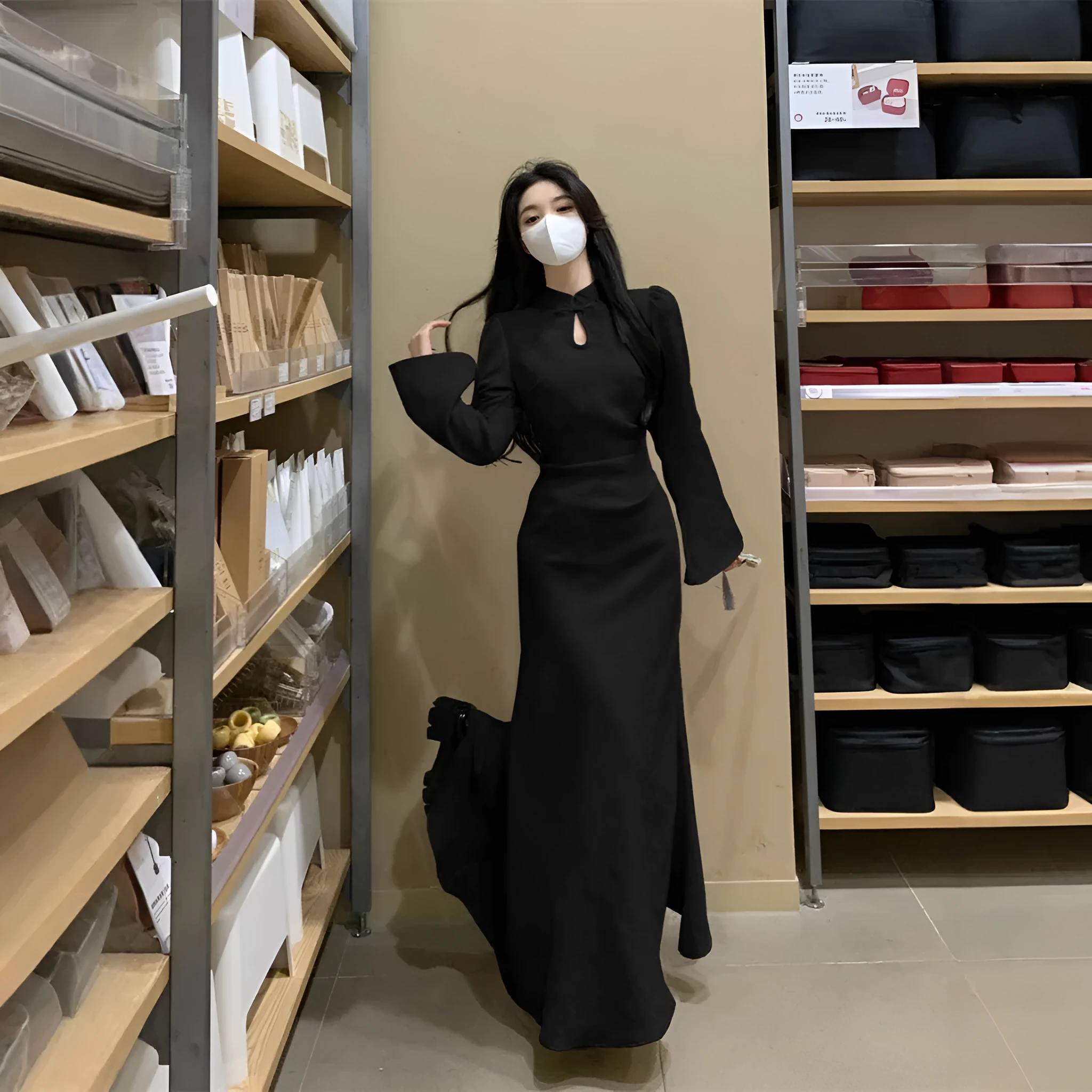 Plus size cheongsam dress in black with waist-tight draping, long sleeves, and long skirt