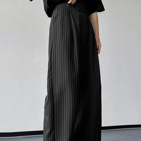 Men's black vertical striped pleated casual trousers showing elastic fabric detail