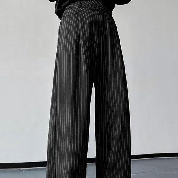 Men's black vertical striped pleated casual trousers showing elastic fabric detail
