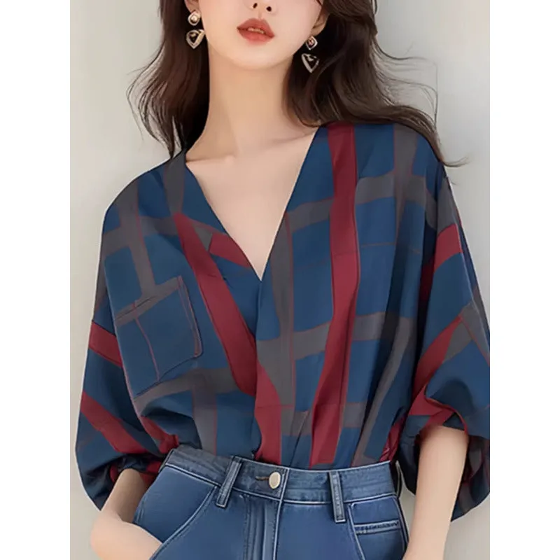 Women's loose polyester pullover top with painted finish and drop-shoulder sleeves in short length, front view
