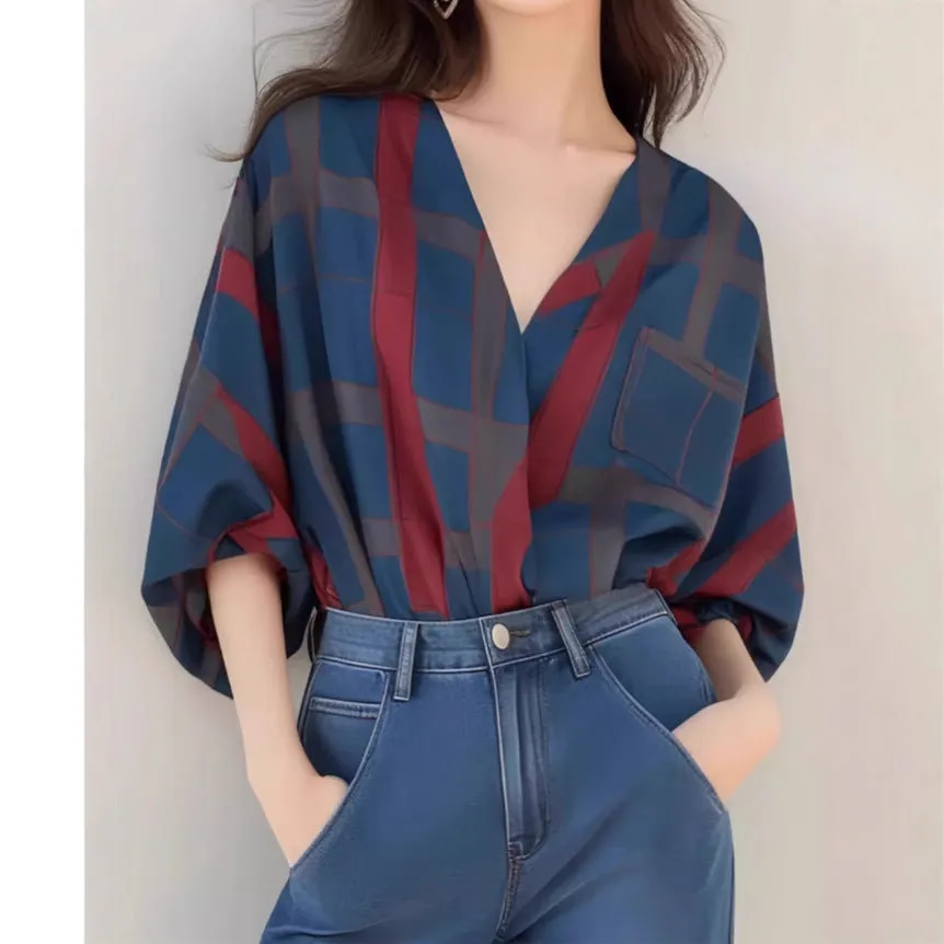 Women's loose polyester pullover top with painted finish and drop-shoulder sleeves in short length, front view