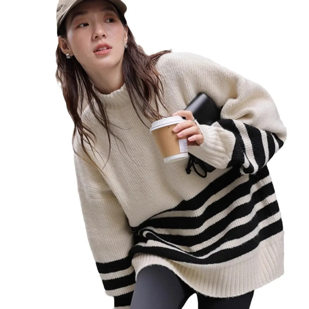Beige loose maternity sweater with stand collar and long sleeves on a plain background