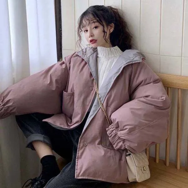 Korean reversible coat made of polyester in apricot colour with pockets and straight cut