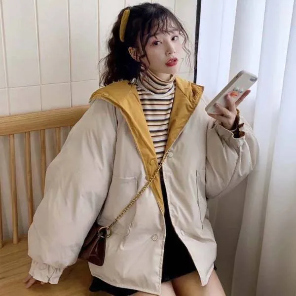 Korean reversible coat made of polyester in apricot colour with pockets and straight cut