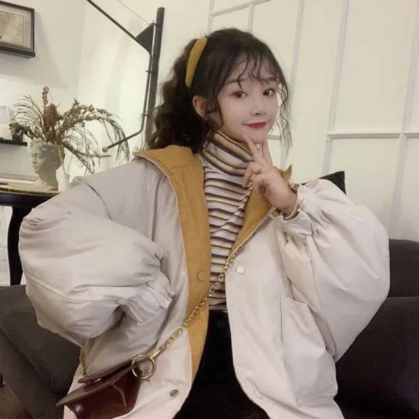 Korean reversible coat made of polyester in apricot colour with pockets and straight cut