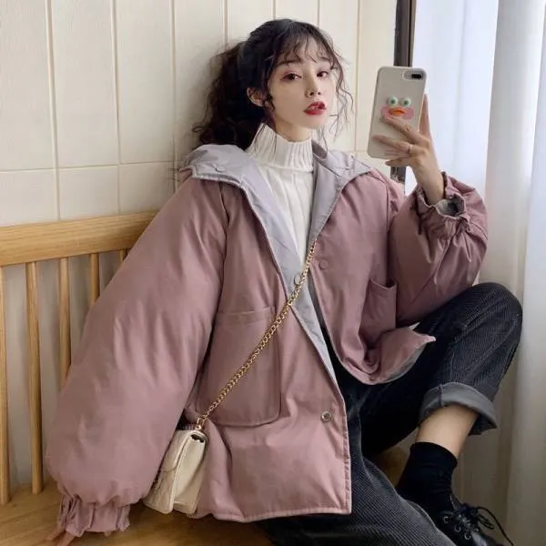 Korean reversible coat made of polyester in apricot colour with pockets and straight cut