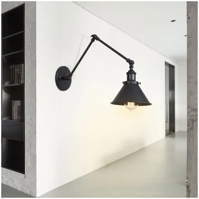 Rocker arm wall lamp with retractable folding arm in iron shade, available in black, gold, or rust