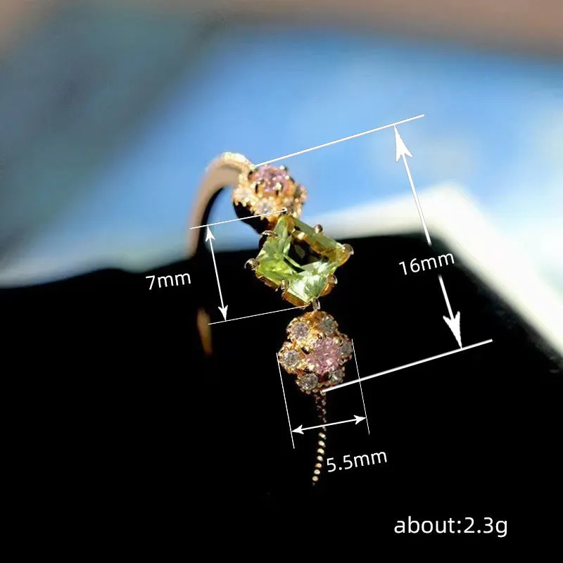 Copper geometric flower ring with Q740 gold finish on grey background, available in sizes No 6-10 for women