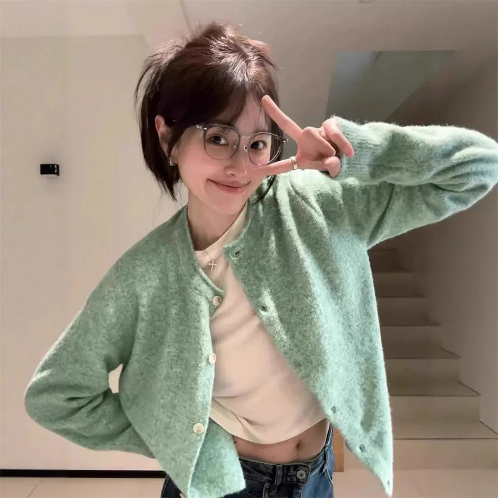 Loose lazy style knitwear top for women, cardigan with splice detail, long sleeves, free size, polyester fabric