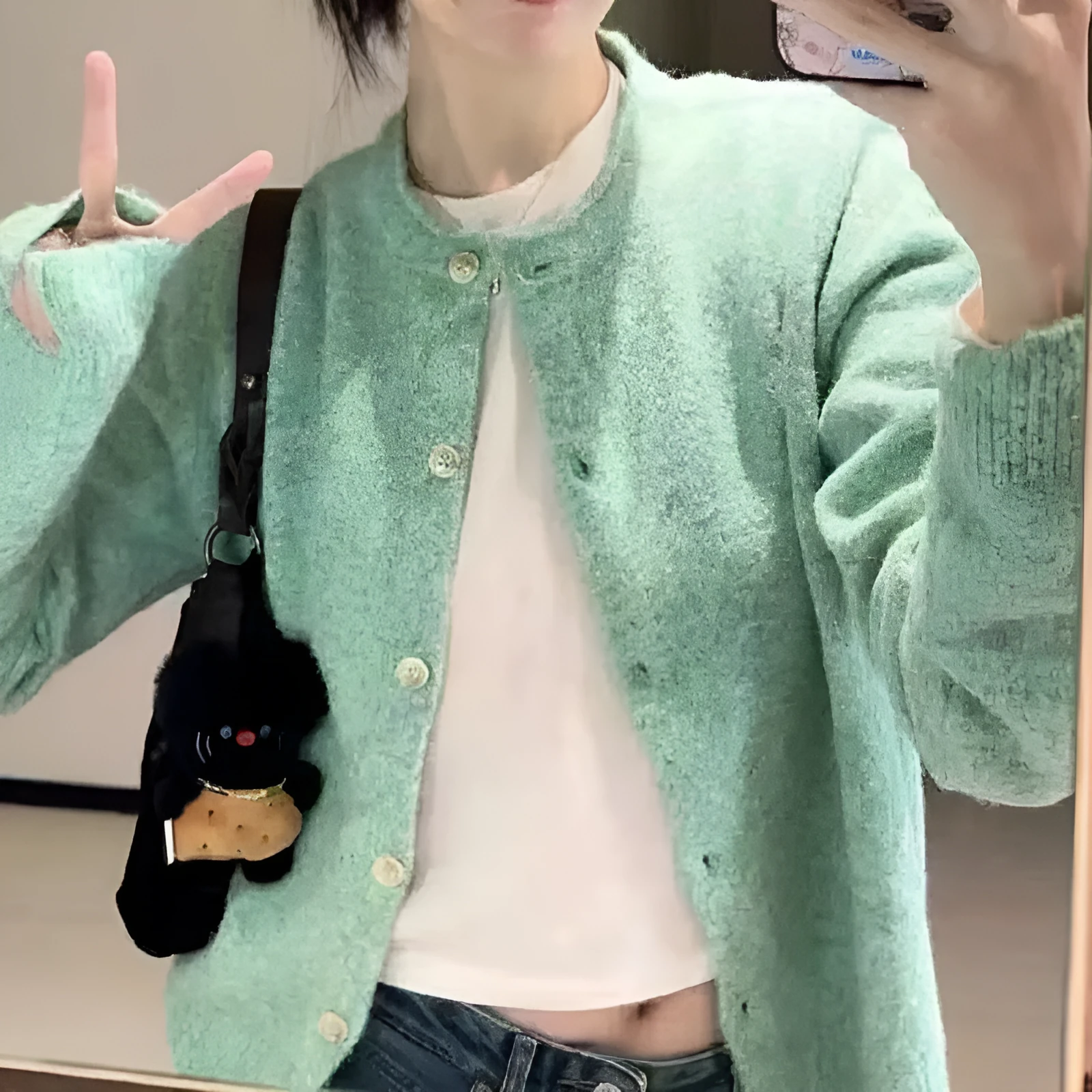 Loose lazy style knitwear top for women, cardigan with splice detail, long sleeves, free size, polyester fabric