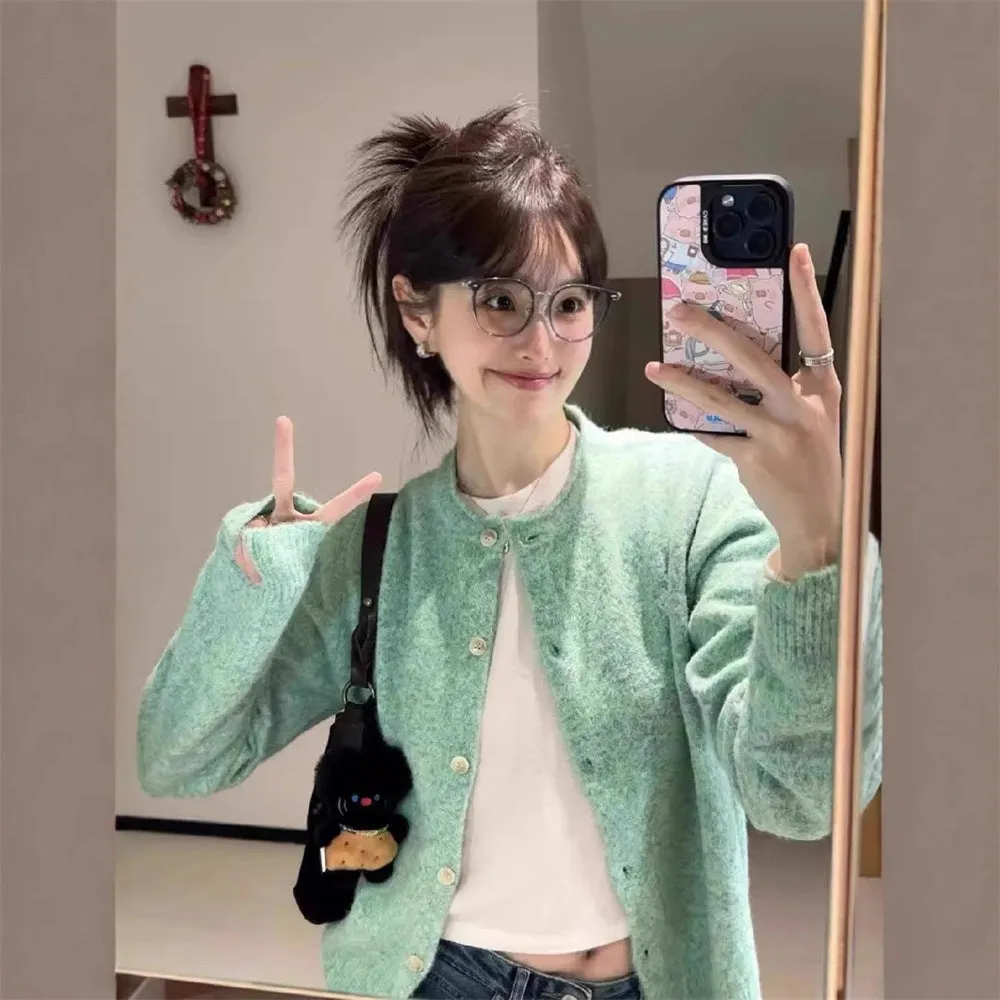 Loose lazy style knitwear top for women, cardigan with splice detail, long sleeves, free size, polyester fabric