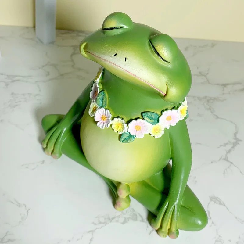 European style Magic Yoga Frog ornament in RDW123 colour on a shelf.
