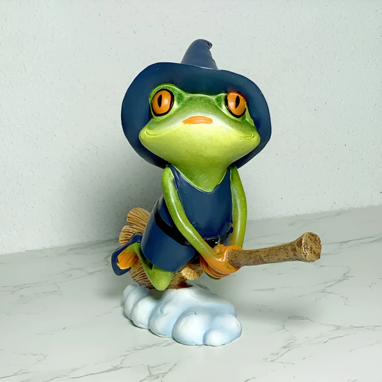 European style Magic Yoga Frog ornament in RDW123 colour on a shelf.