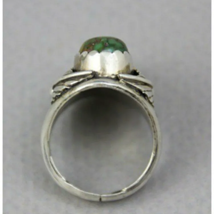 Women's silver-toned geometric alloy ring with a square turquoise blue inlaid centre on a white background.