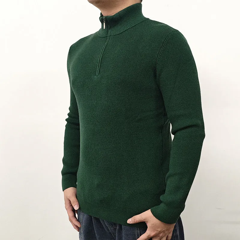 Men's black half-turtleneck zip sweater on a hanger, showing long sleeves and zip front detail.
